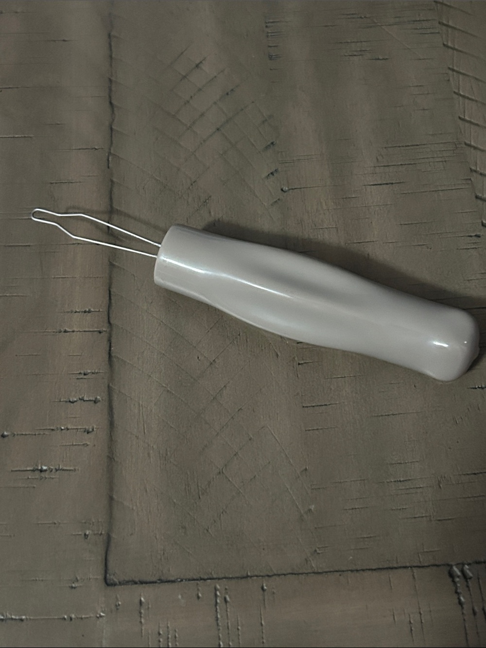 Weighted button aid